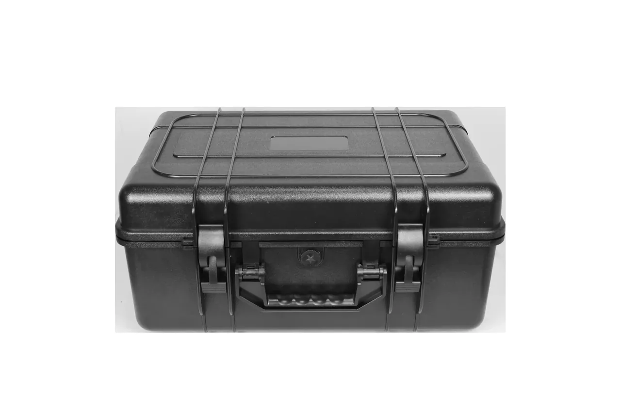 Top view of the black case front edge, two latches over the rim, a star-head screw inside the central recess