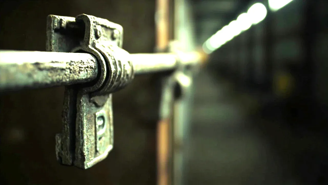 Close-up of the latch and padlock hasp, latch engaged