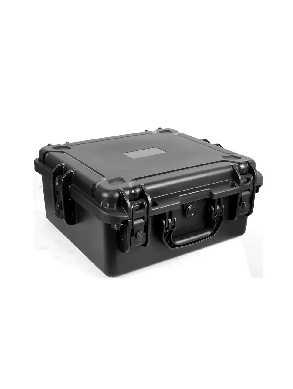 Black case closed at an angle, two draw latches and a folding handle on the front, a blank rectangular label area on the lid, raised corner pads