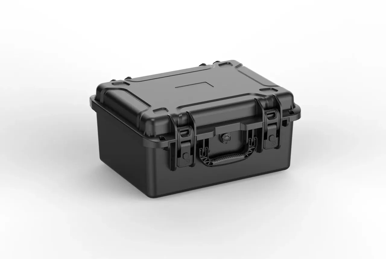 Black case closed at an angle, a round valve plug above the handle, a rectangular recessed label area in the middle of the lid