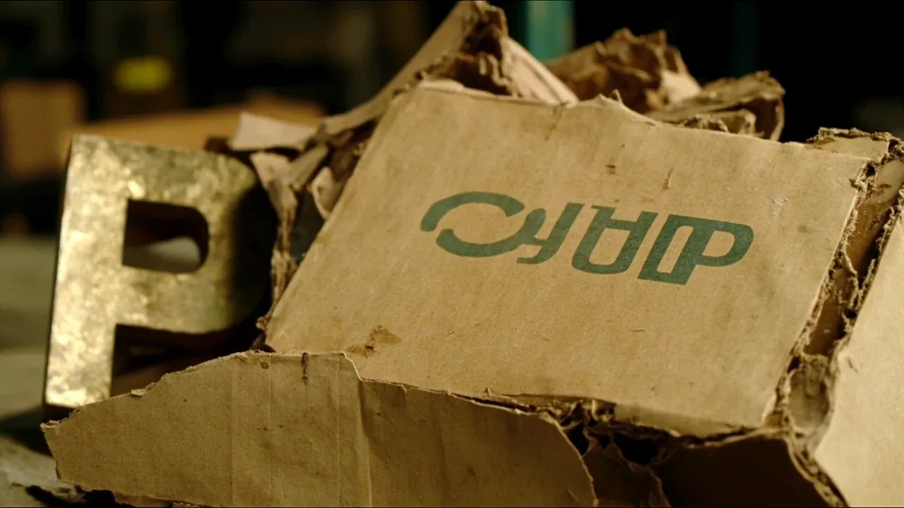 A crushed carton beside an intact rotomoulded box