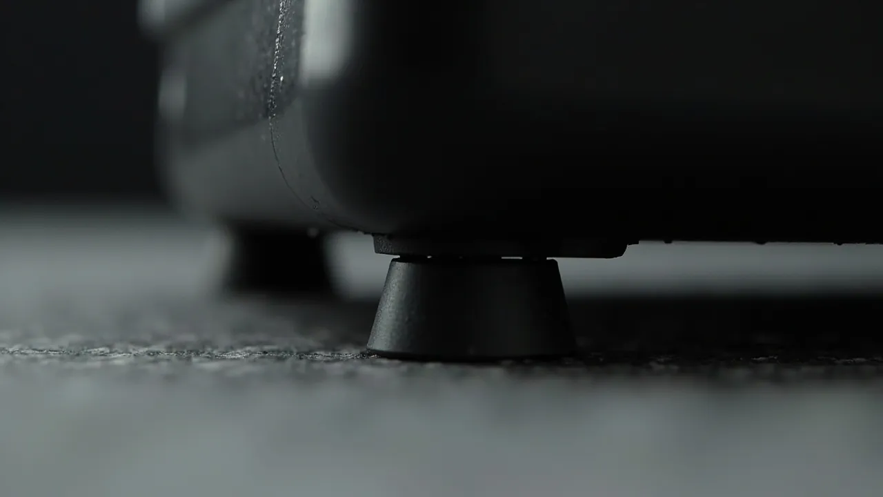 Anti-slip rubber feet on a case bottom corner