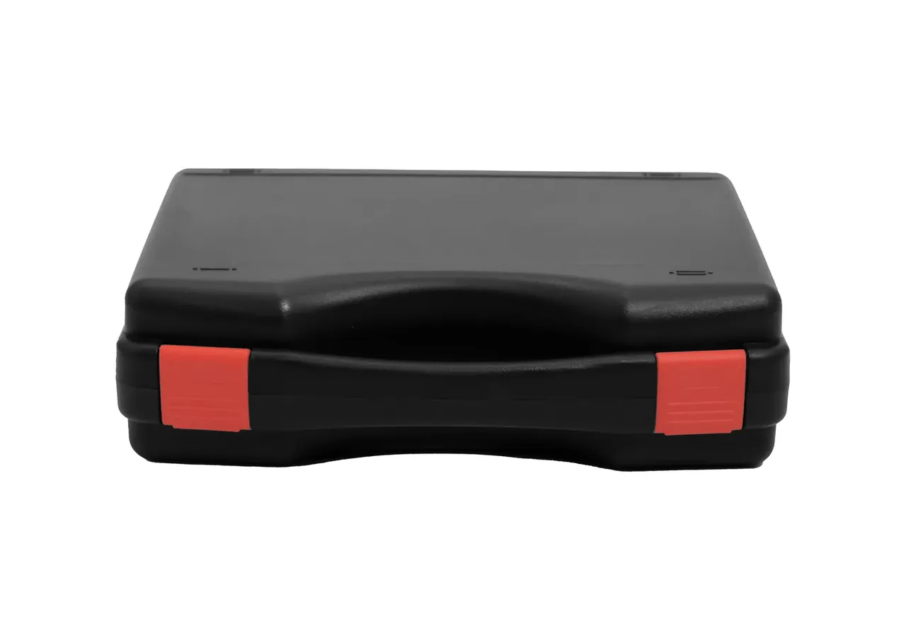 Case Export to US body seen head on, low closed profile, one red latch at each front corner, pressed handle recess on the lid