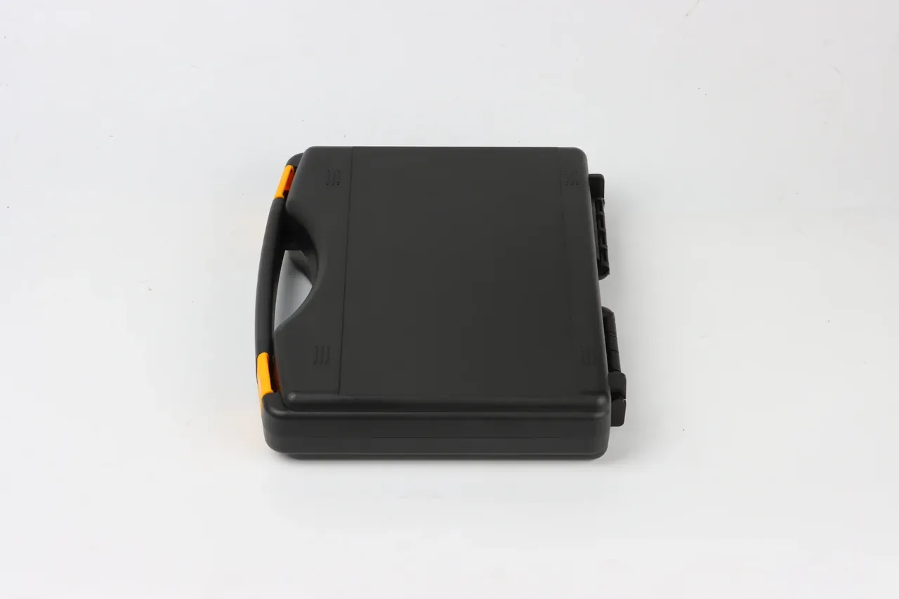 Case Internal Divider: a black carry case lying sideways on white, two yellow latches at the left edge, hinge knuckles on the right