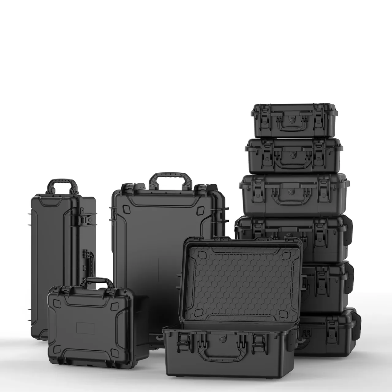 Packing Cases in one colour family, seven black units grouped, a column of five stacked right, a tall case standing left, one open in front
