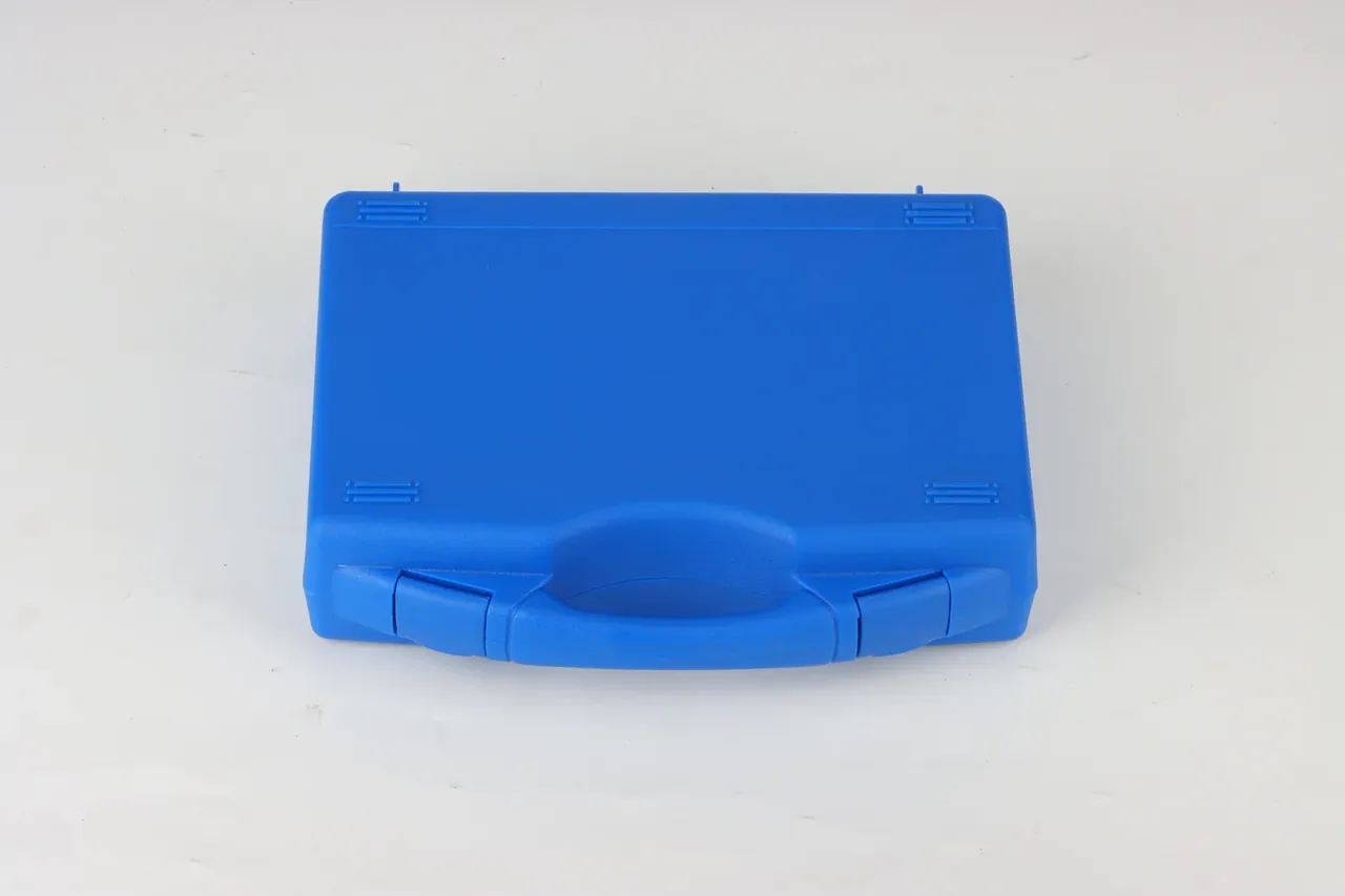 Case Showroom: front view of the blue case closed, handle pressed flat, a latch either side, two hinge pins at the rear edge