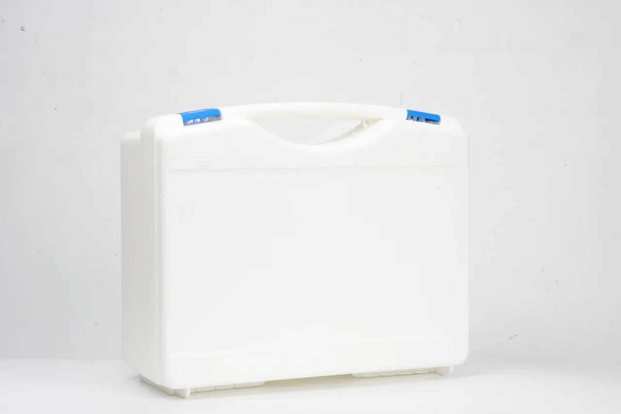 UV stabilisers shown on an off white PP case, arc handle cut out, one blue latch at each lid end, plain walls, white backdrop