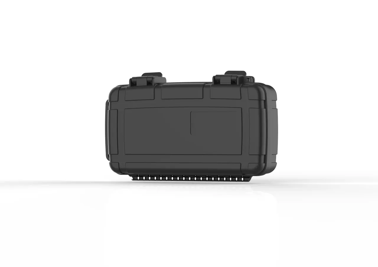 The same case from the other side: both latches on the upper edge, one large rectangular recess in the flank