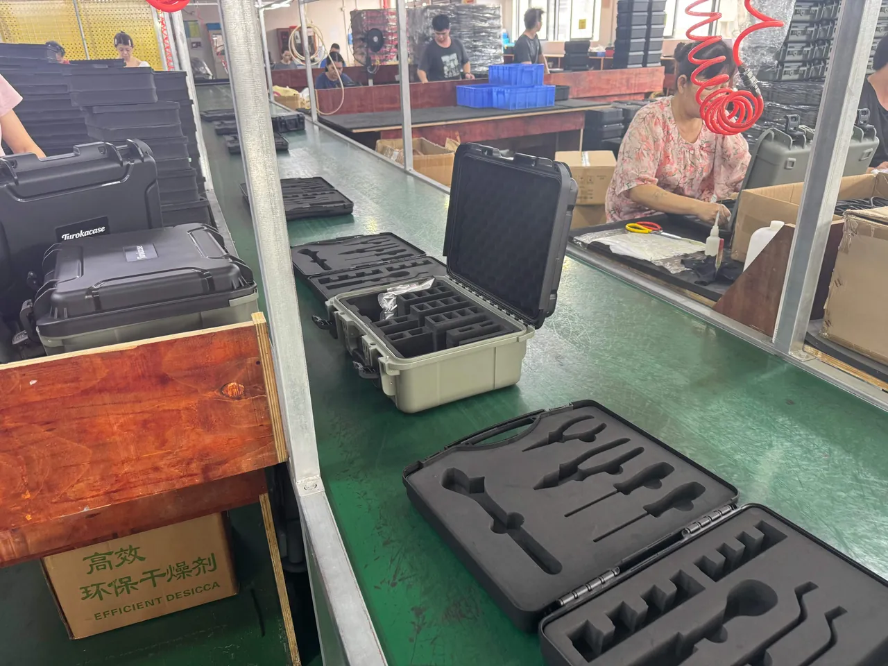 Mask, snorkel and fins stored in partitioned bays of a moisture-resistant case foam