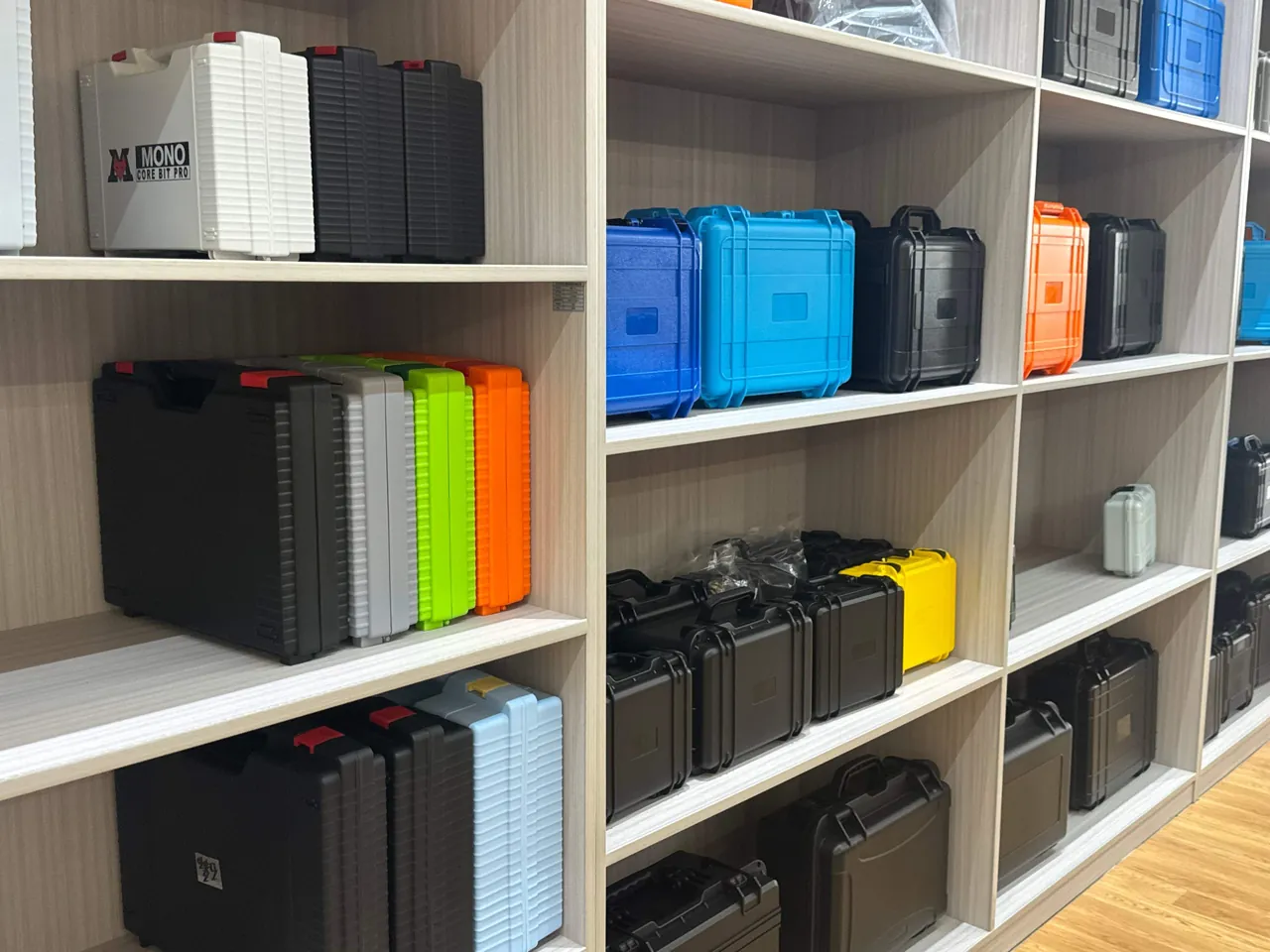 Rows of stick tubes placed horizontally into a case insert with buffered clearance at both ends