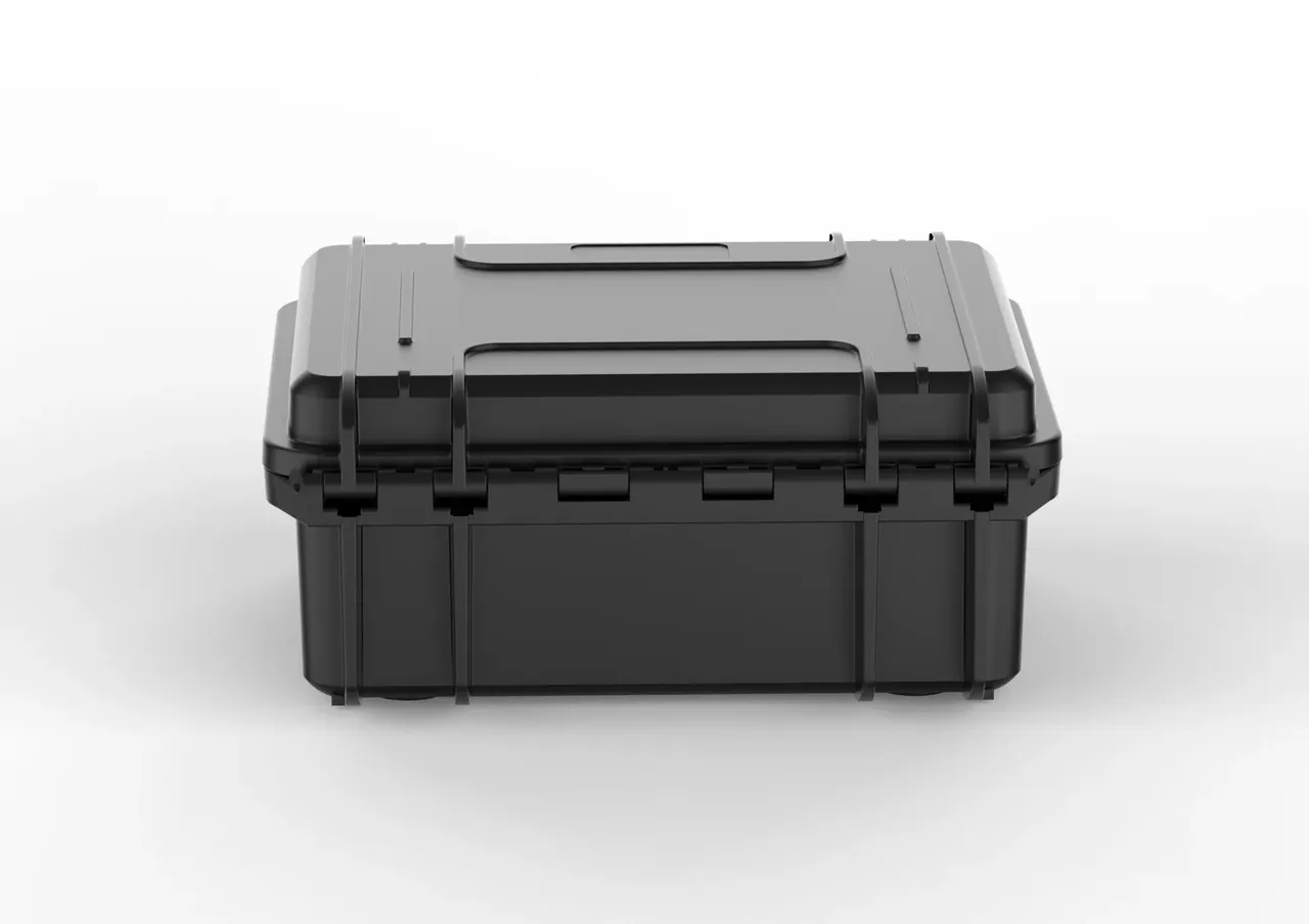 Case lying on its side, two latches closed on the parting line, one recessed label plate on the lid and one on the base