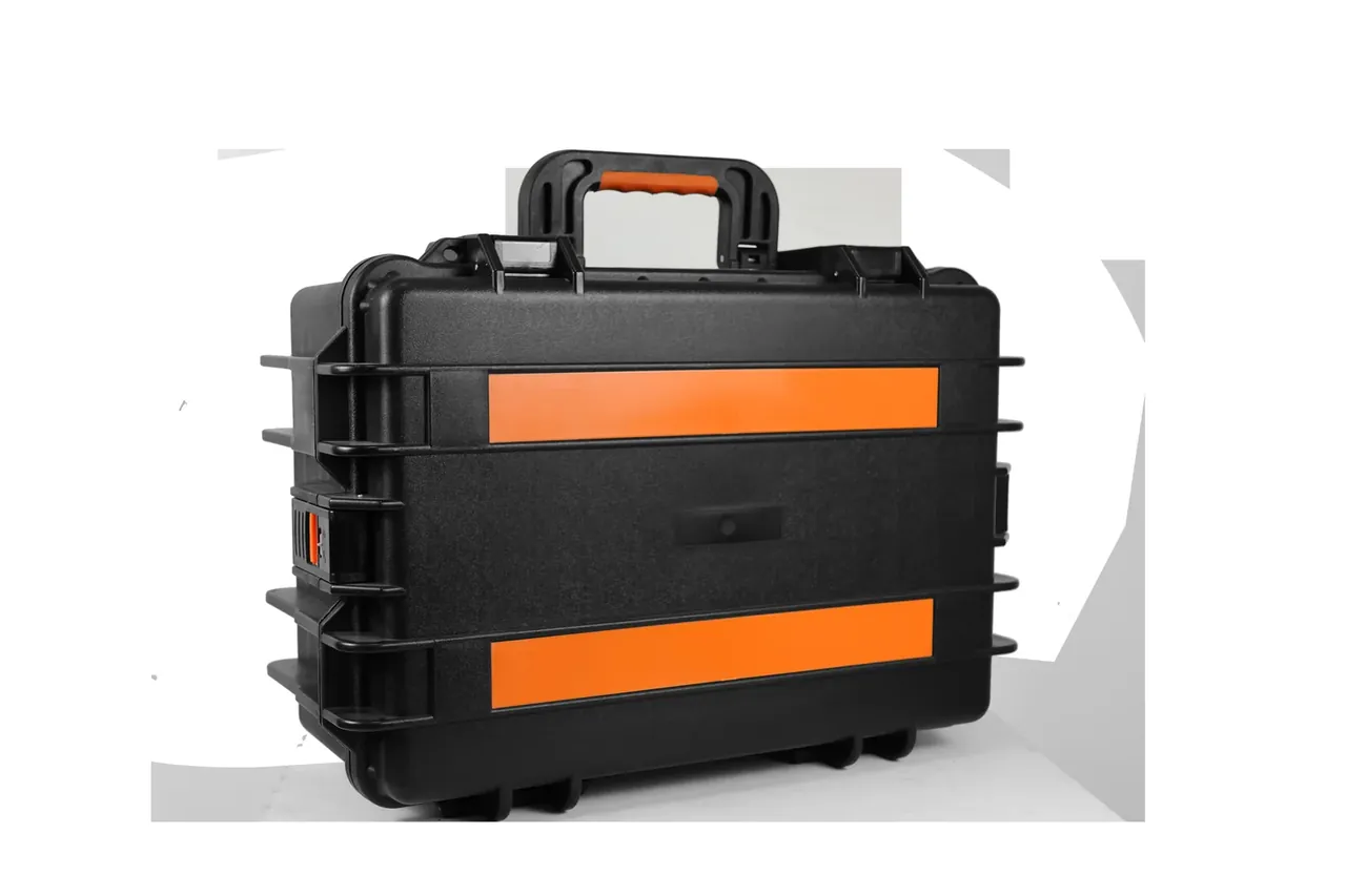 Same case at forty-five degrees, both front bands aligned, side ribs and orange latches visible