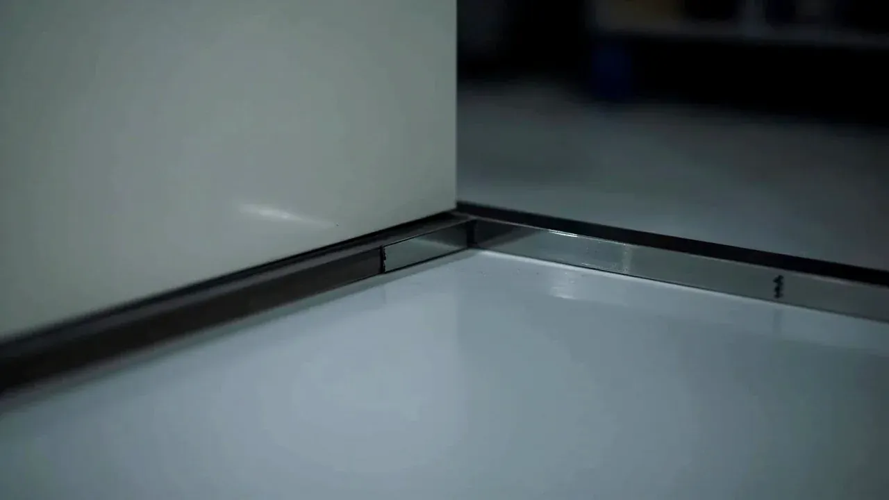 Close-up of the floor anchor and anti-tip bracket