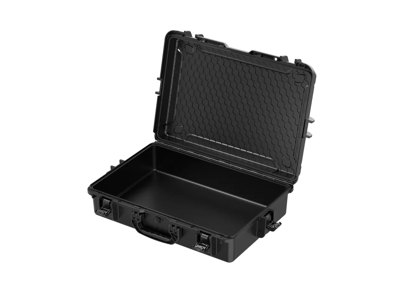 Case open at an angle, honeycomb lid ribs and empty base in one view, handle and two latches on the front wall