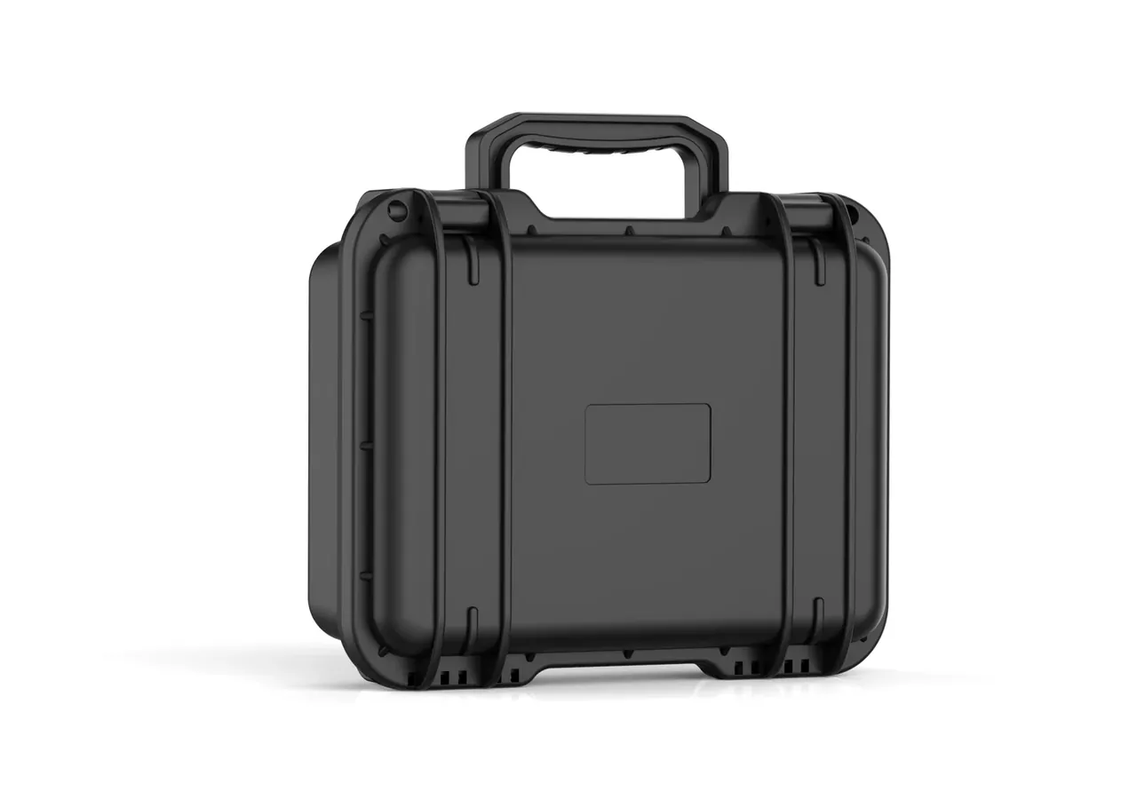 The same body from a rear three-quarter angle, two vertical ribs, the blank label recess and the top handle