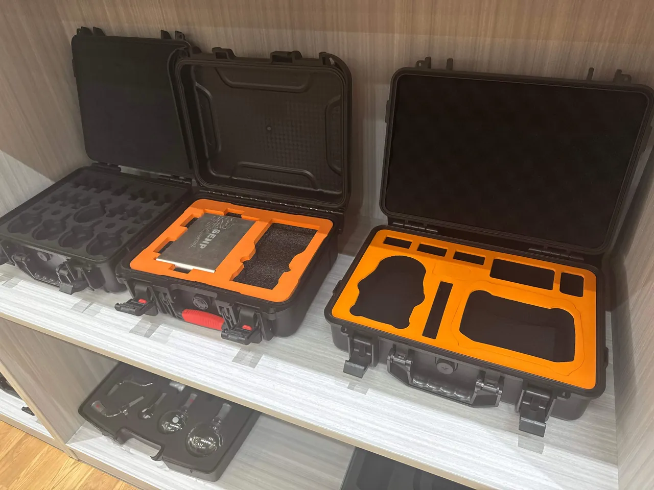 Multiple stacked laboratory animal transport cases loaded with vent openings exposed and clearance channels preserved