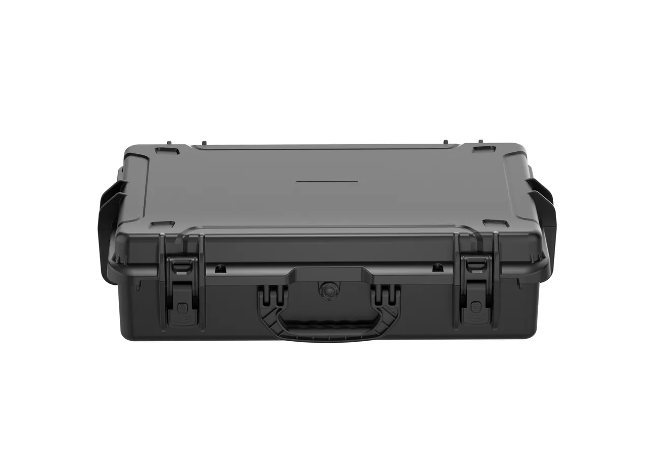 Detail of a leather goods case showing perimeter gasket, full-width metal hinge, two-action draw latch and metal seal eyelet
