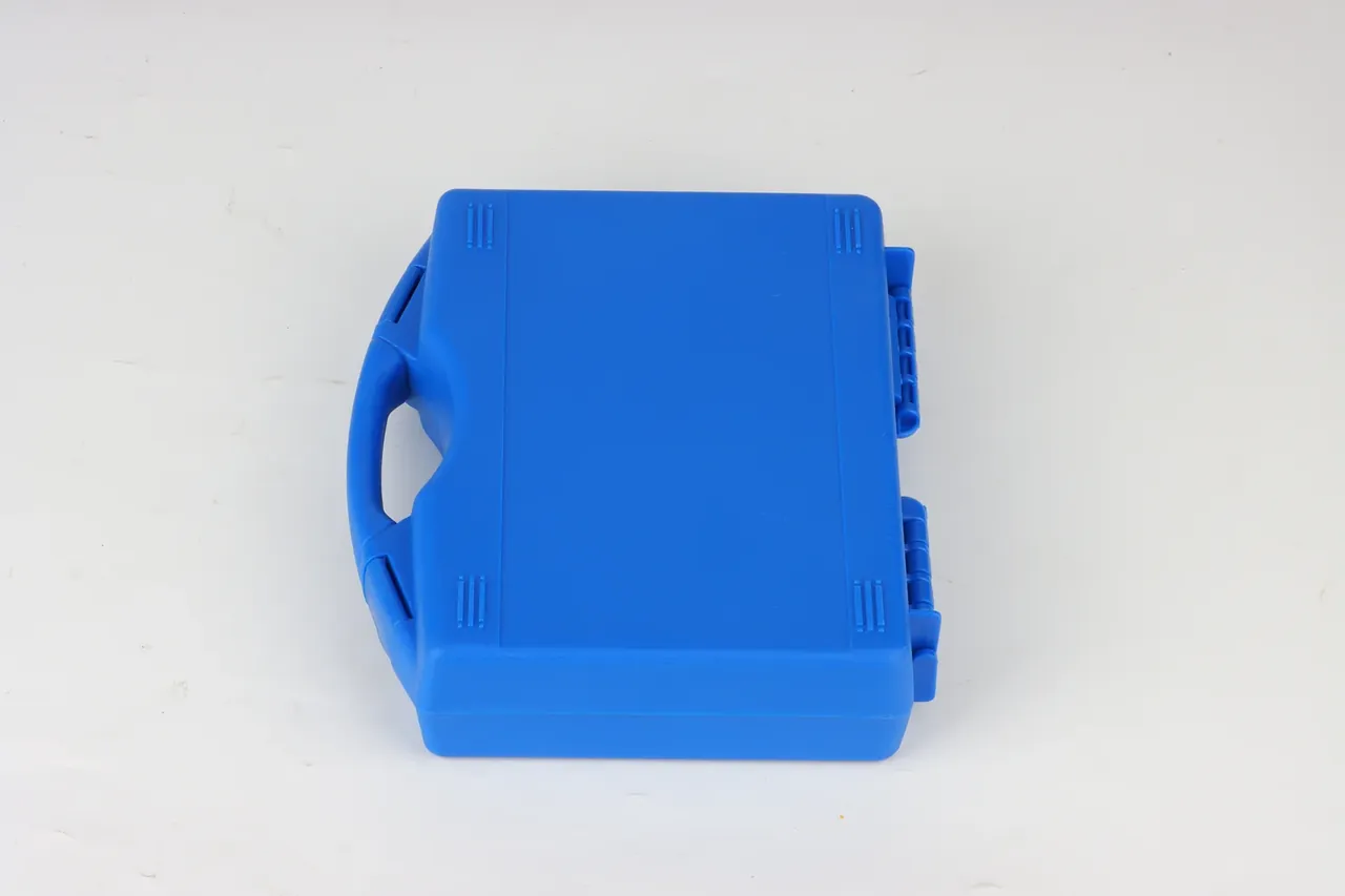 Light blue case from above, handle at the left, two latches proud of the right wall, ribs at each corner