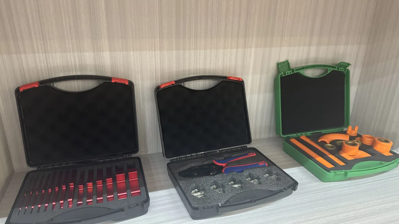 Shelf scene showing a cutaway of an engineering-plastic case with visible PP shell, EPDM sealing gasket and high-density EVA liner in layered structure