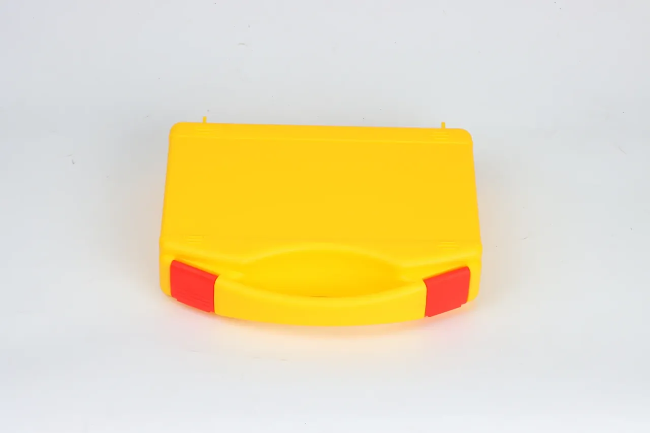 Military Supply Case: yellow closed case on a white background, two horizontal ribs along the lid edge, curved front handle, one red latch each side