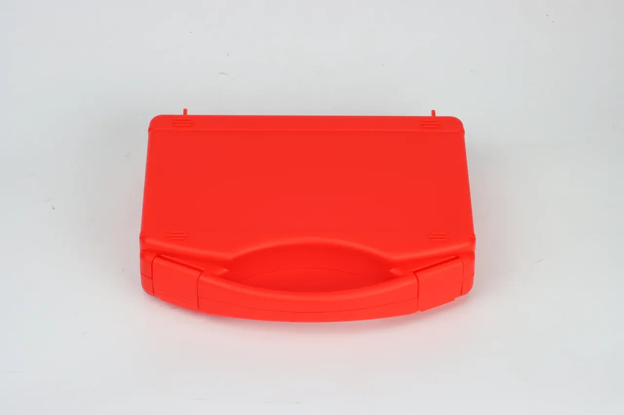 Military Supply Case: bright red case facing forward on white, darker red latch at each end, arched handle in the same colour, two hinge pins