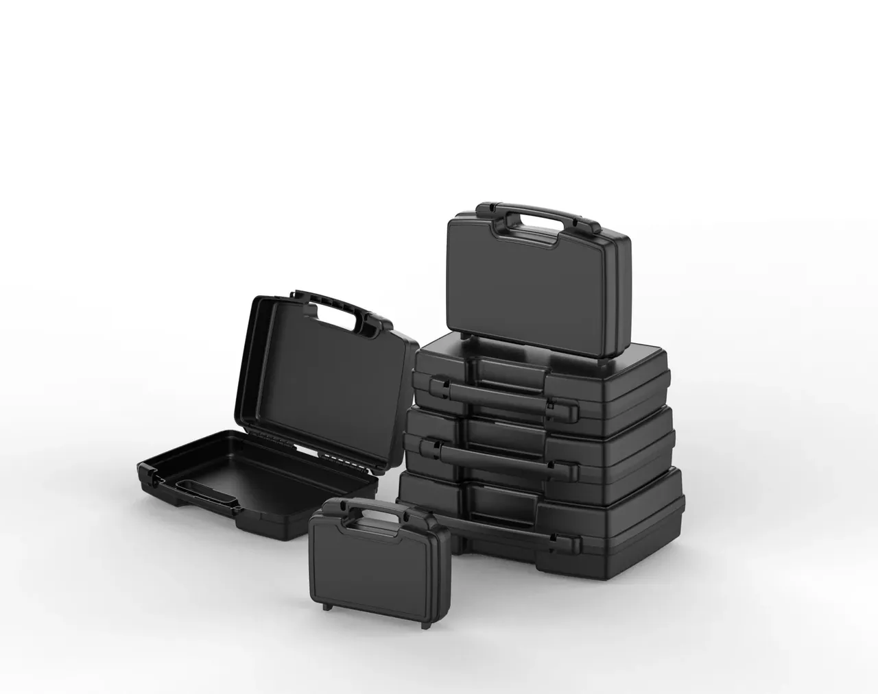 Black missile boxes stacked closed, three aligned, one standing on top, one open at left, a small case in front