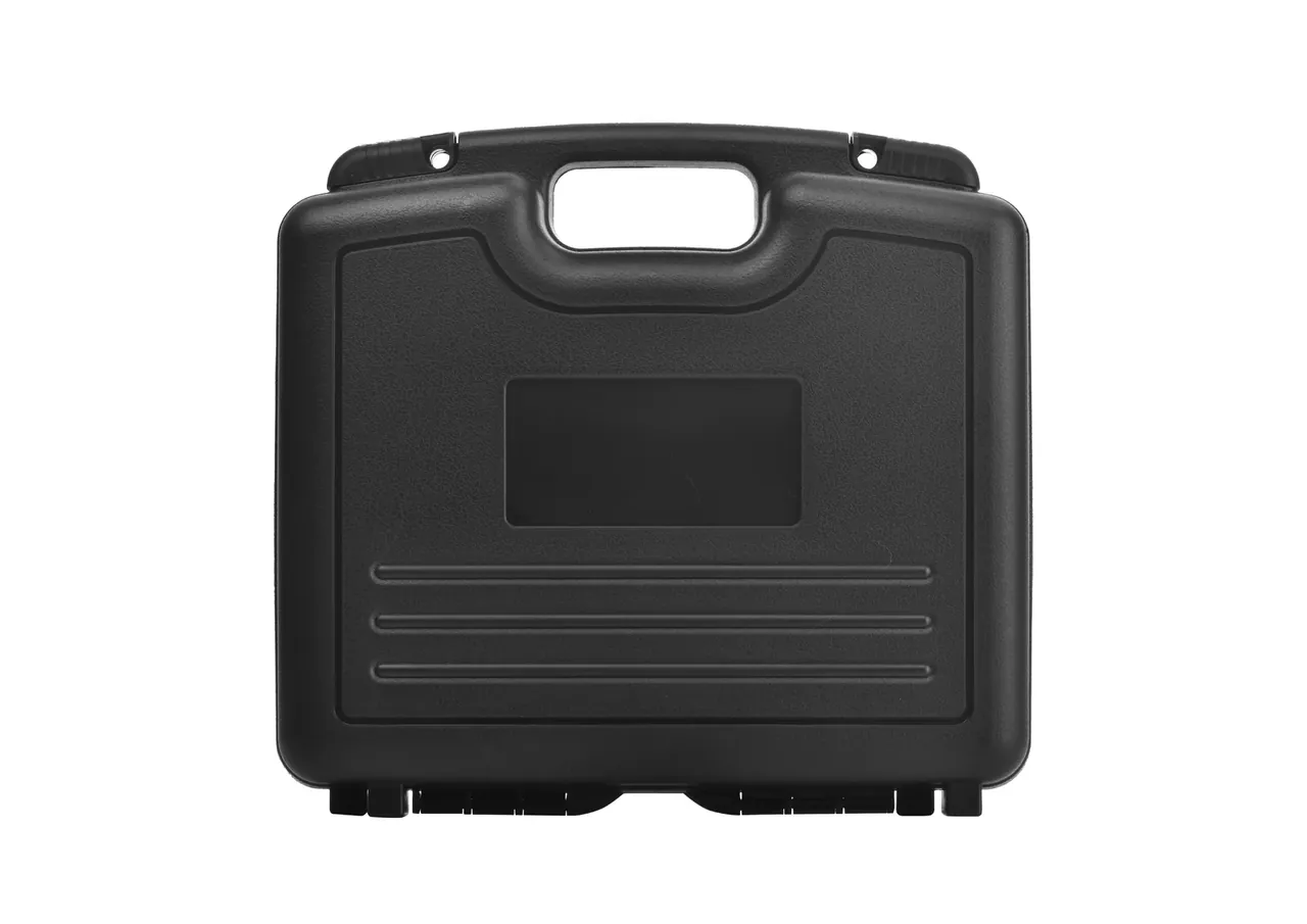 The black case closed face-on, handle centred, three horizontal ribs below the recess, feet visible at the base