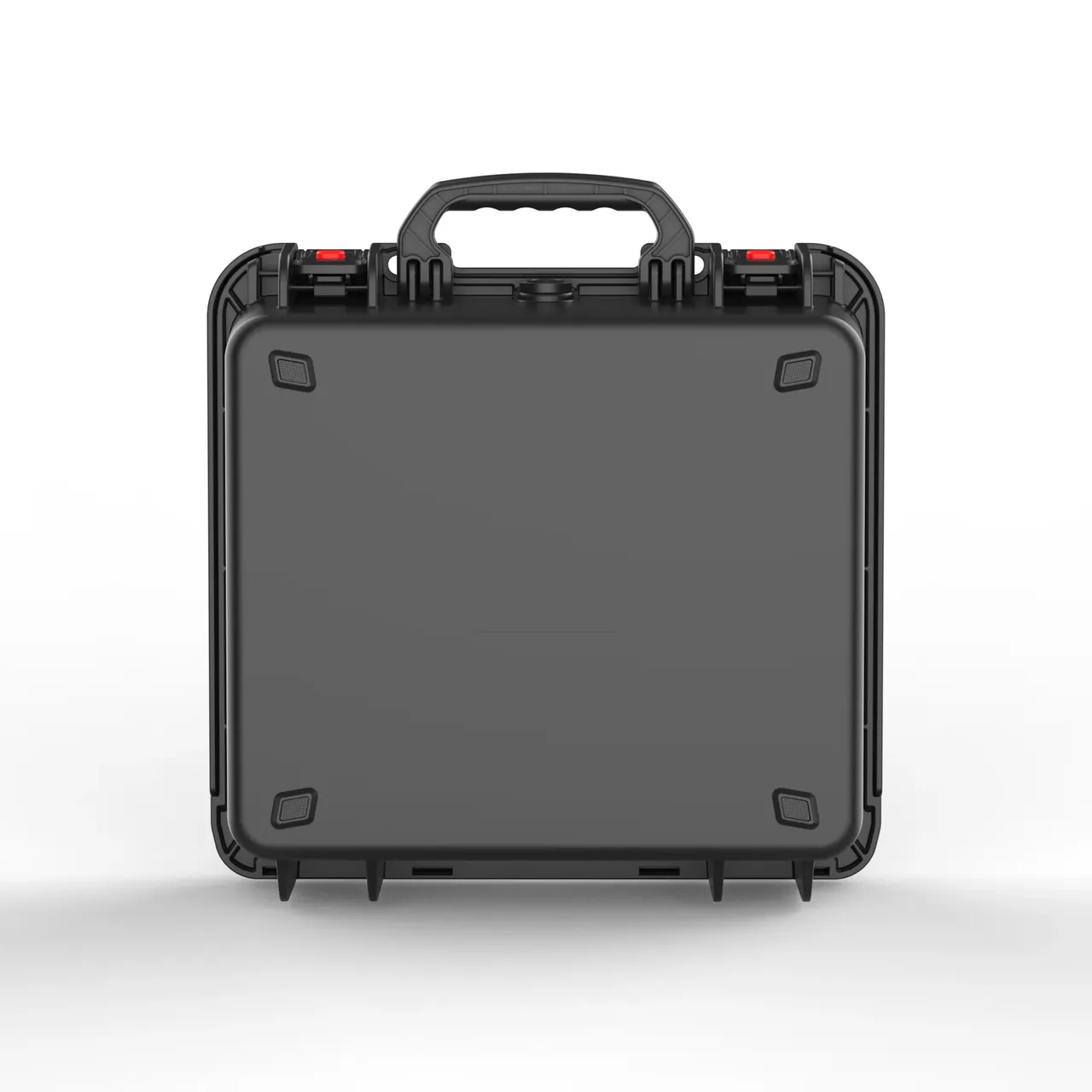 The case from the front, with the two draw latches on the upper edge carrying red inserts, square corner pads and a hinge along the lower edge