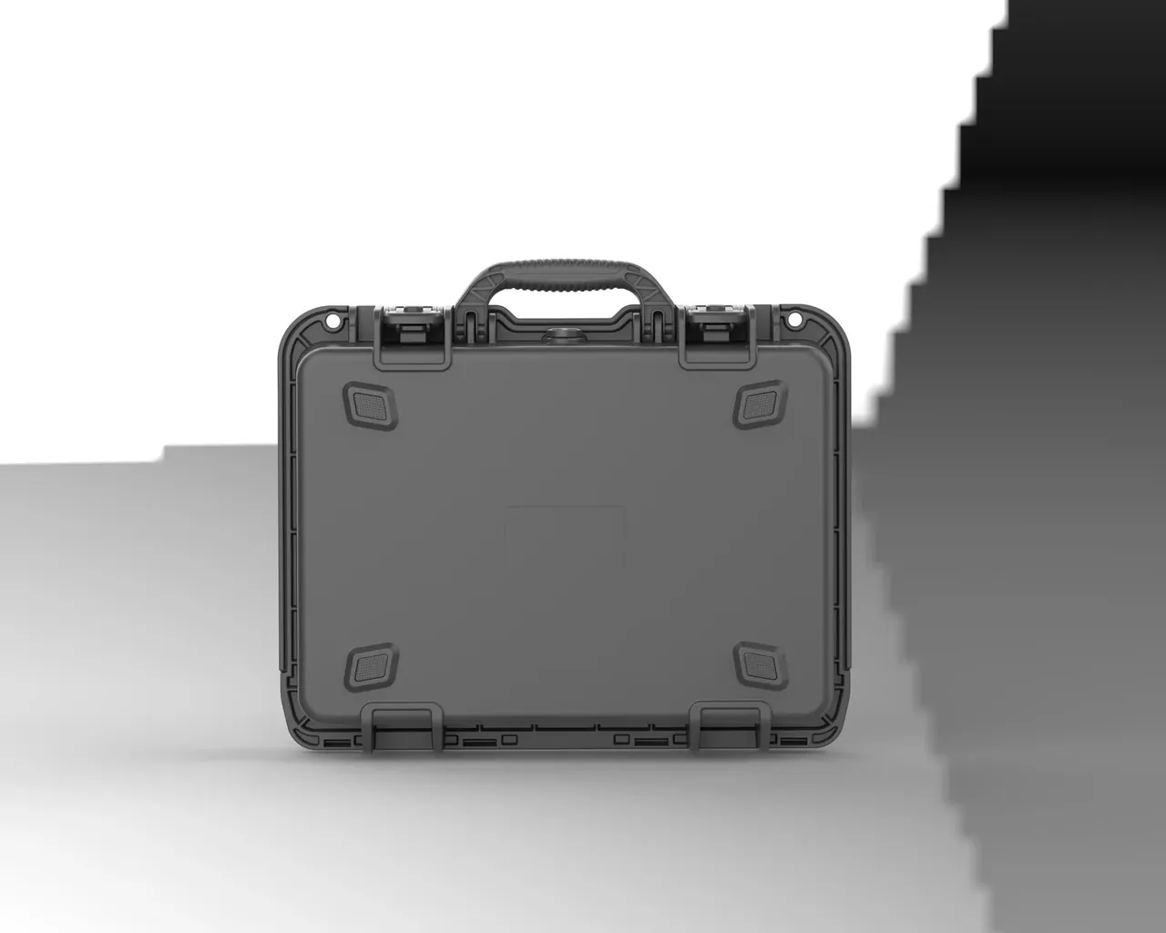 The base seen flat on, square pads at the four corners, hinge and latch profiles along the long edges