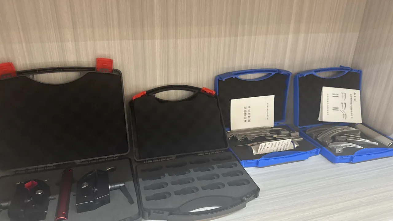 Shelf scene of plastic parts boxes in snap-in stacks, front transparent windows revealing fasteners divided by specification inside