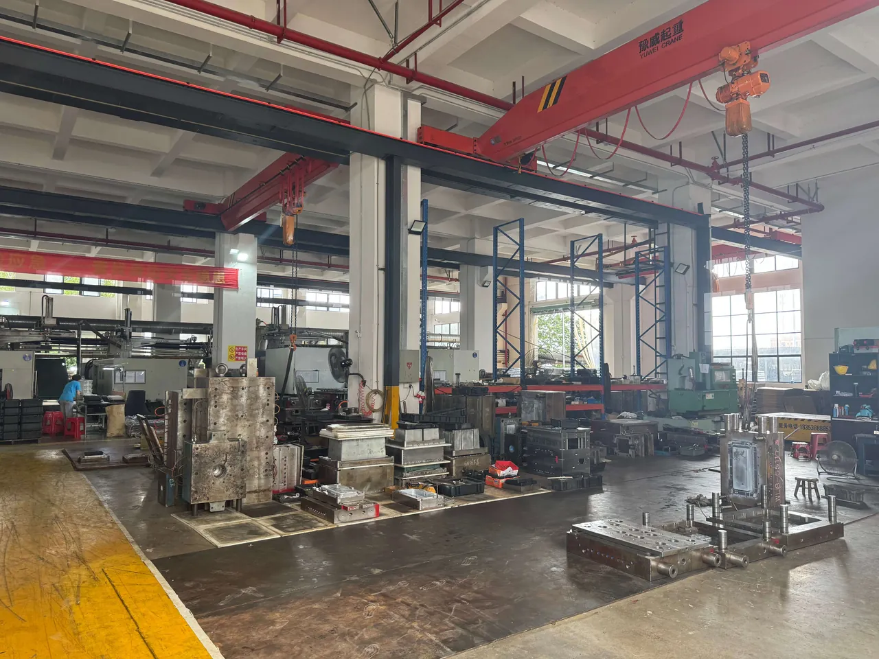 Warehouse with multi-layer stacked latch-sealed cases, waterproof grade and batch labels on surfaces