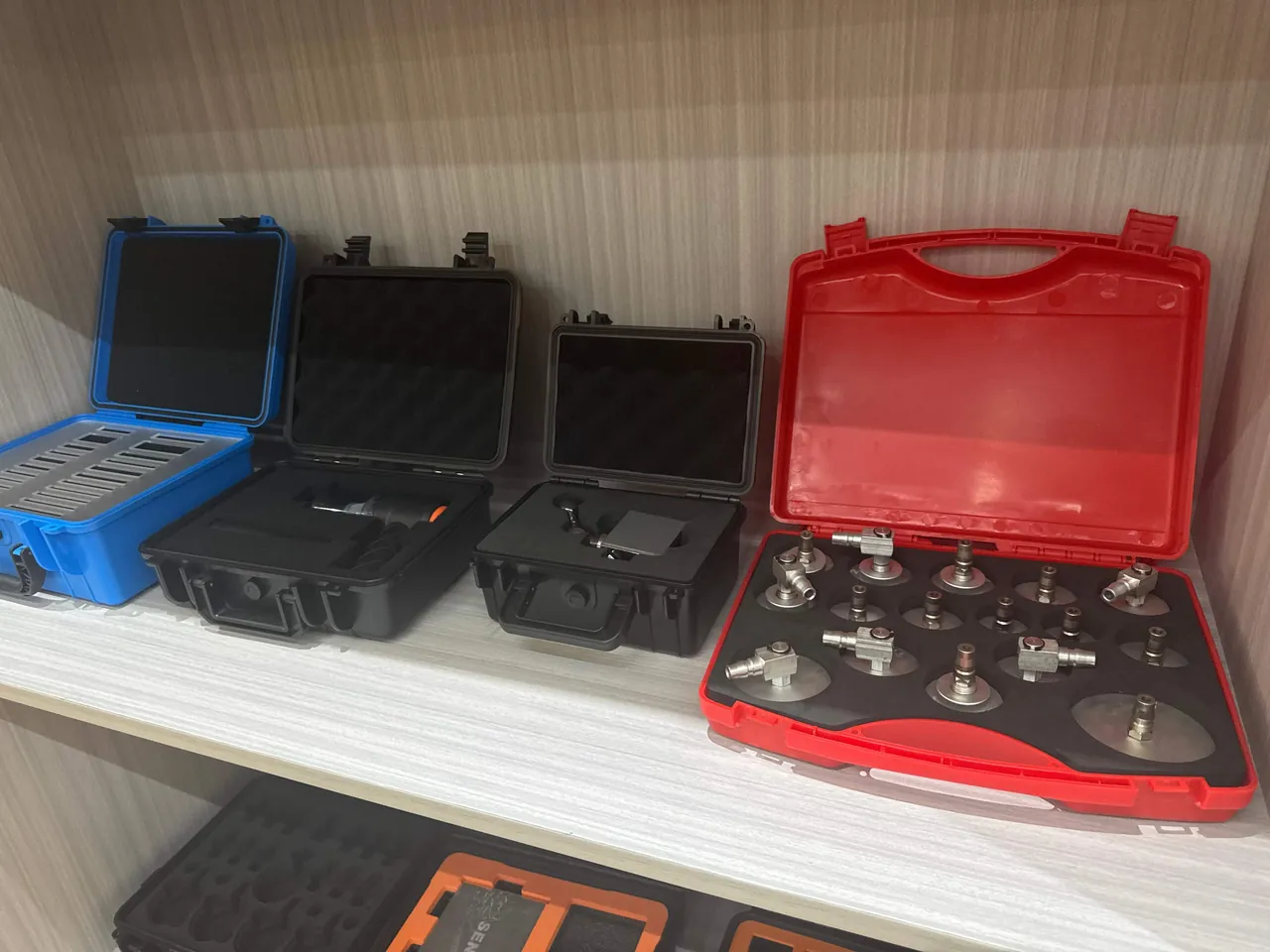 Archive boxes separated by acid-free liners with a moisture-buffering layer and humidity indicator card fitted