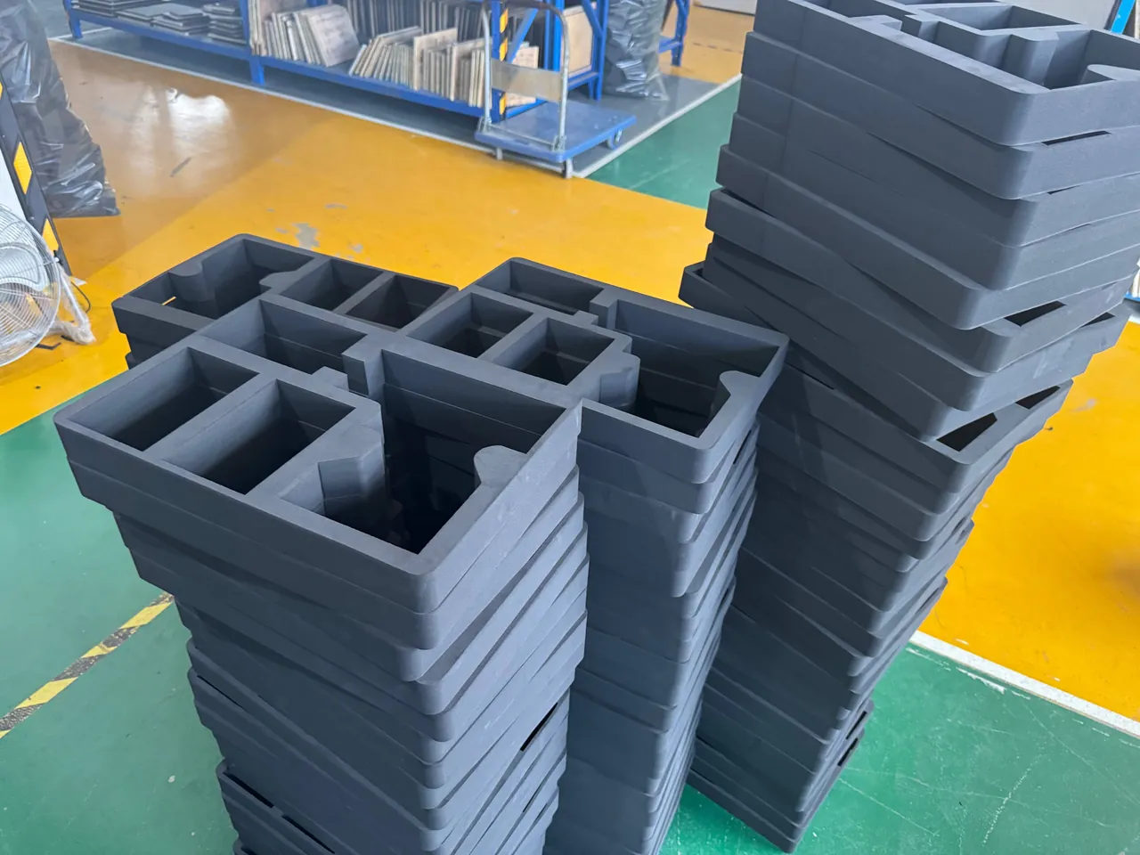 wafer carriers and chip carriers positioned independently in low-outgassing inserts