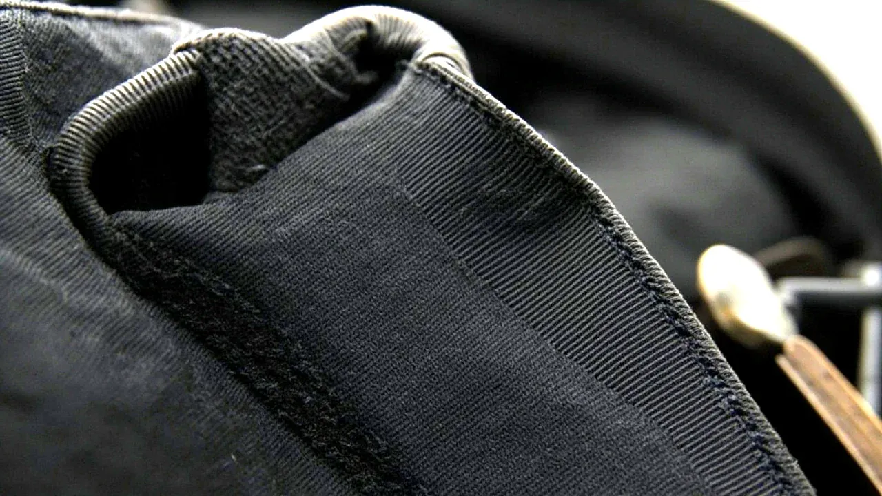 Close-up of a heavy nylon tool bag with webbing handles and bar-tacked stress points