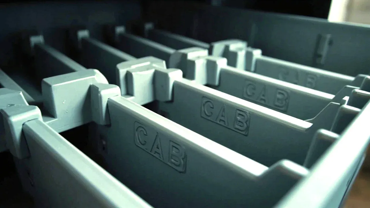 Close-up of the internal shelf and dividers with empty cradles